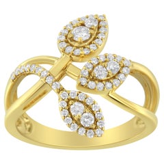 Anillo de oro amarillo de 10 quilates con diamantes de 1/2 quilate en capas cruzadas y triple hoja de bypass