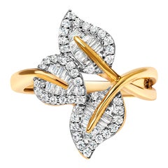 10k Gelb und Weißgold 1/2 Karat Baguette Diamant Bypass Triple Leaf Ring