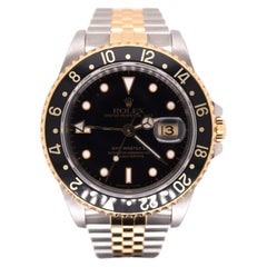 Montre Rolex 40mm GMT-Master II Or jaune 18k/Acier Noir Jubilé 16713