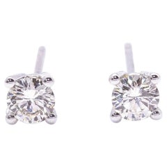 Boucles d'oreilles solitaires en diamant