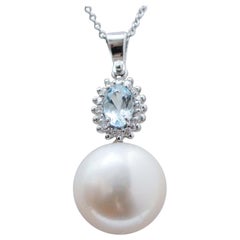 Aquamarine Colour Topaz, Diamonds, Pearl, 18 Karat White Gold Pendant Necklace.