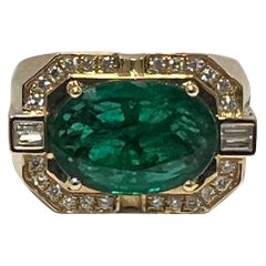 Used 7.40 Carat Oval Emerald Mens Ring 