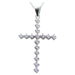 Diamonds, 18 Karat White Gold Cross Pendant Necklace.