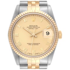 Rolex Montre Datejust en acier, or jaune et cadran champagne pour hommes 16233