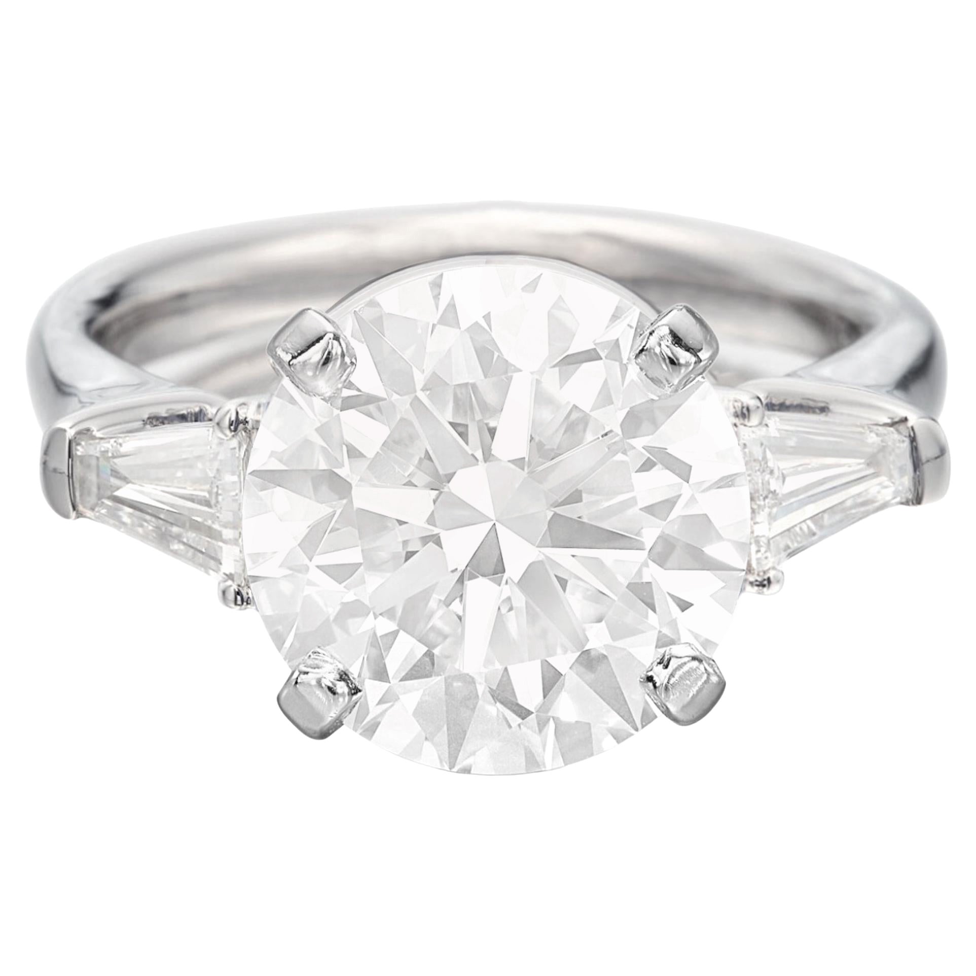 GIA Certifield 5 Carat Round Brilliant Cut Diamond Ring with tapered baguette For Sale