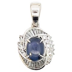 Platinum 4.35 crt Blue Star Sapphire. with .95 crt Diamond Pendant