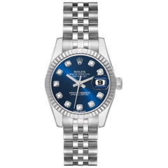 Rolex Montre Datejust en acier, or blanc, cadran bleu et diamants 179174