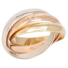 Bague Les Must De Cartier en or blanc, jaune et rose 18 ct.