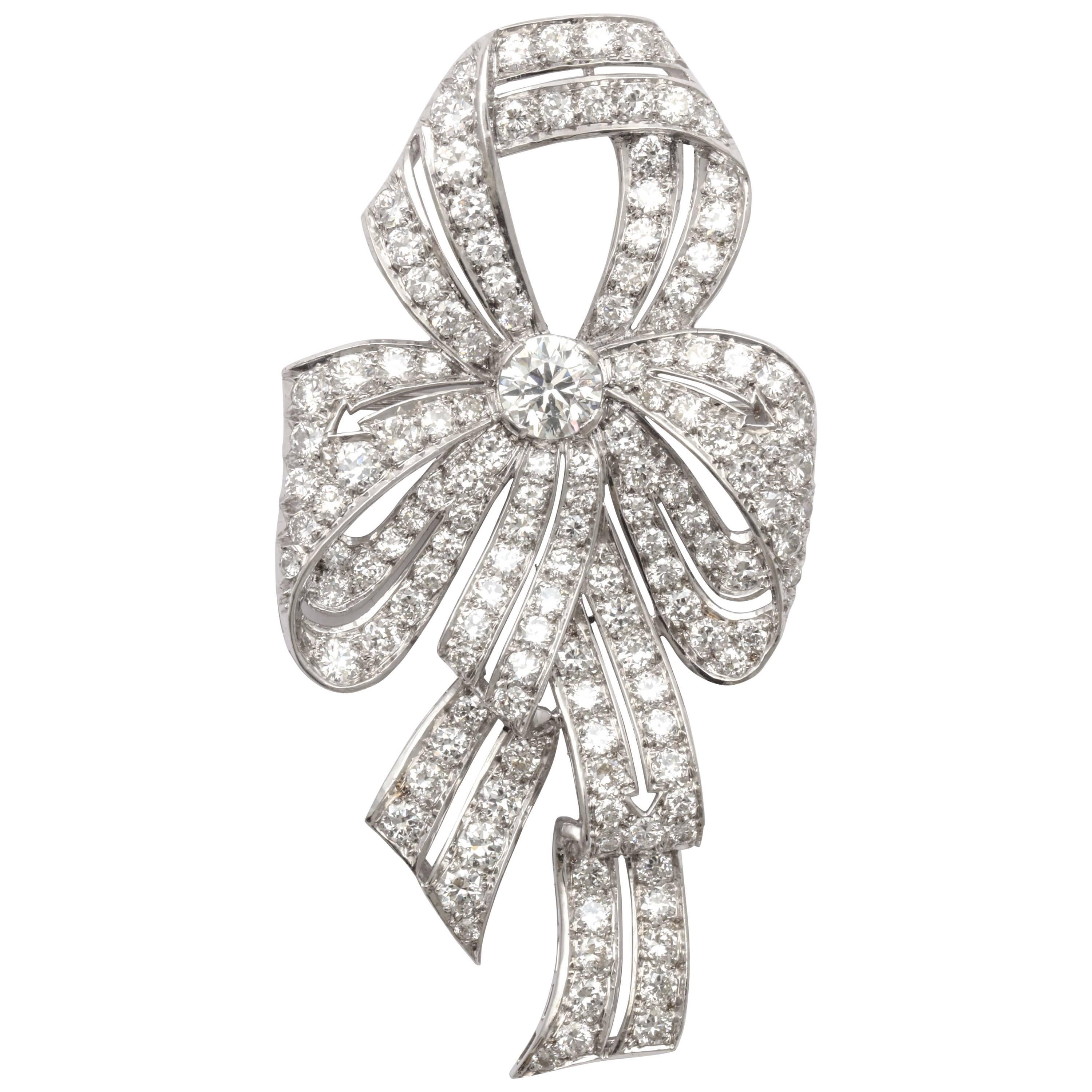 Emerald Diamond Platinum Ribbon Brooch at 1stdibs