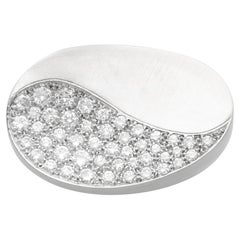 Broche vintage en or blanc 18 carats et diamants 3,30 carats