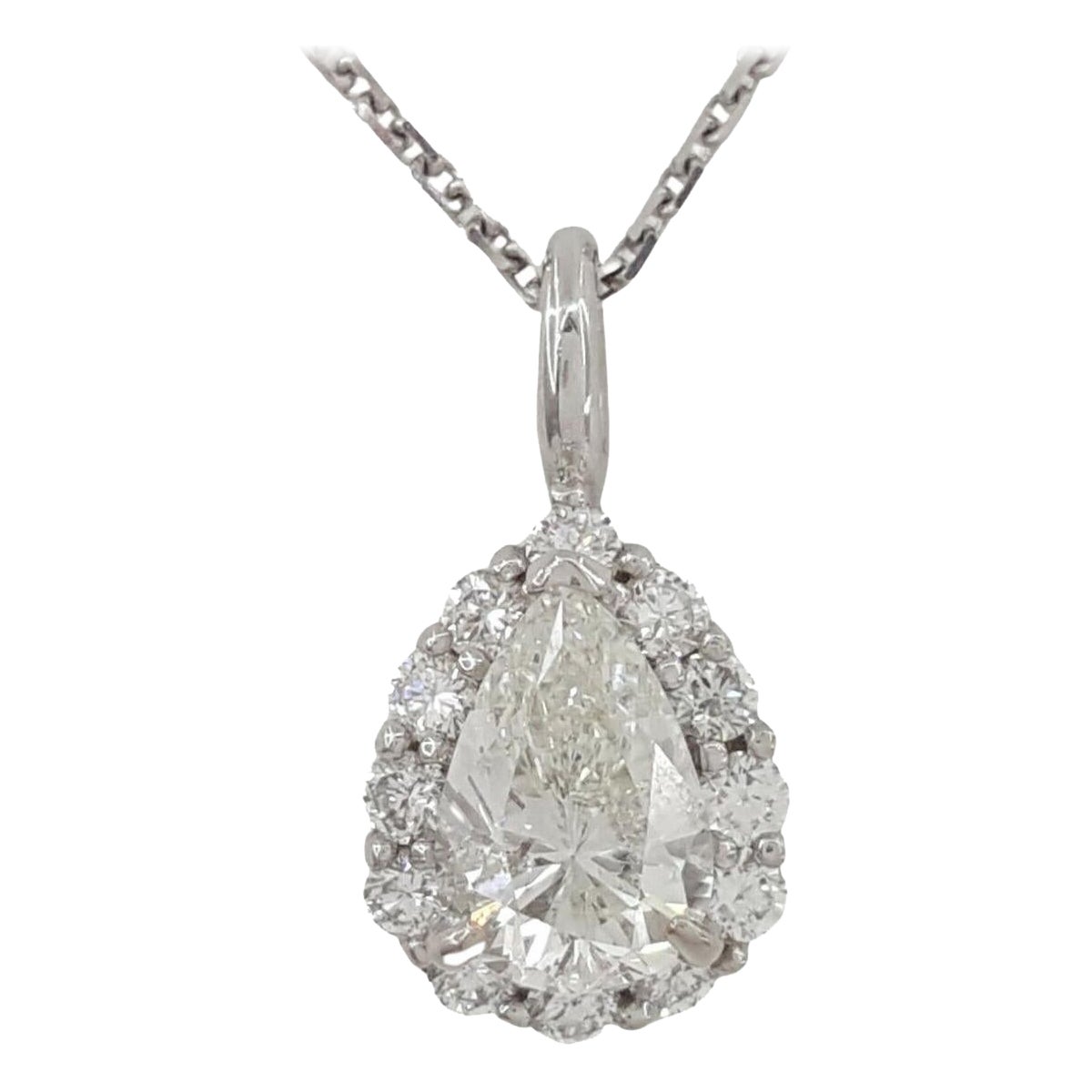 GIA Certified 1.2 Pear Cut Halo Diamond with Halo Pendant Necklace en vente