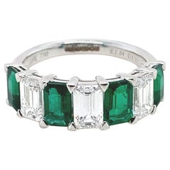 Emerald and Diamond Seven Stone 18 Karat White Gold Ring