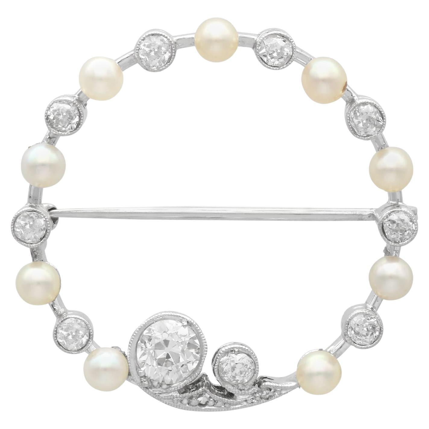 Broche ancienne en or blanc 15 carats, perles et diamants de 1,18 carat, c. 1910