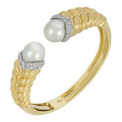 Bracelet en or jaune avec perles et diamants
