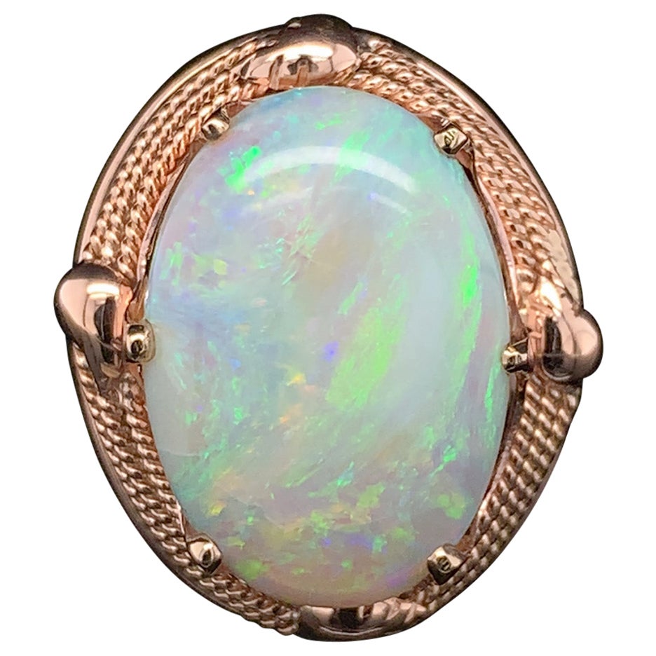 14K Rose Gold Hand Wrought Ring with a large 6.05 carat Australian Opal For Sale