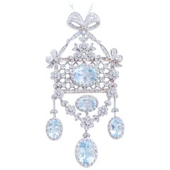 Vintage Aquamarine Colour Topazs, Diamonds, 14 Karat White Gold Pendant Necklace.