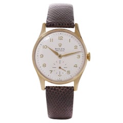 Vintage Rolex Precision 9kt. gold men's manual winding wristwatch with Dennison case 