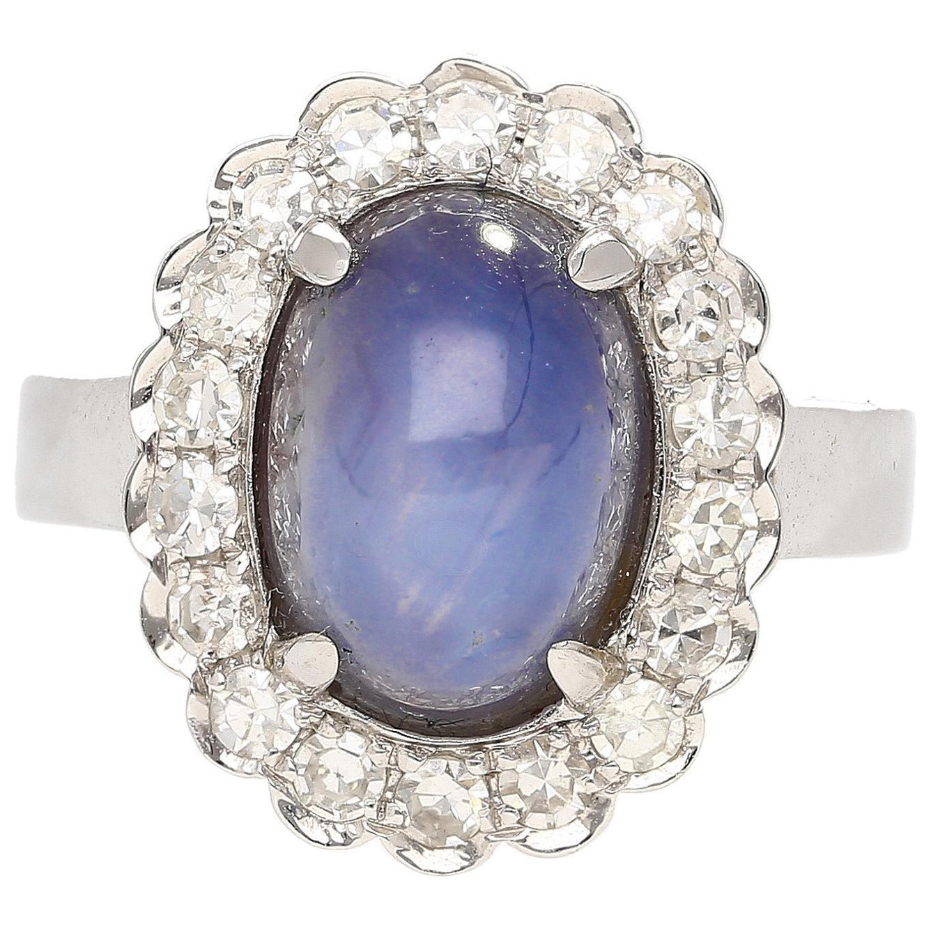 9.07 Carat Blue Star Sapphire & Diamond Halo Ring in 18K White Gold For Sale