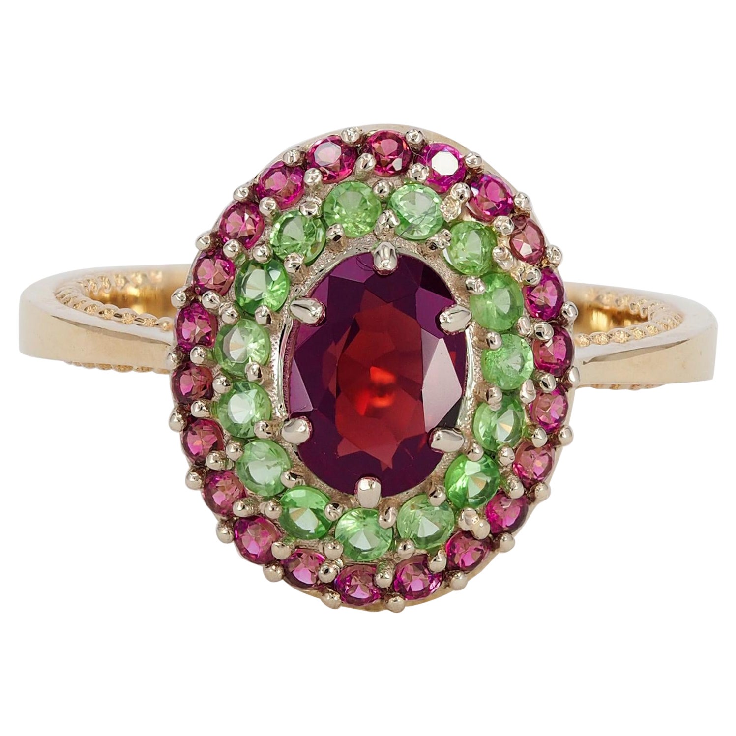 Garnet ring with side tsavorites and rubies. For Sale