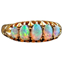 Used Opal five stone ring, 18k yellow gold 