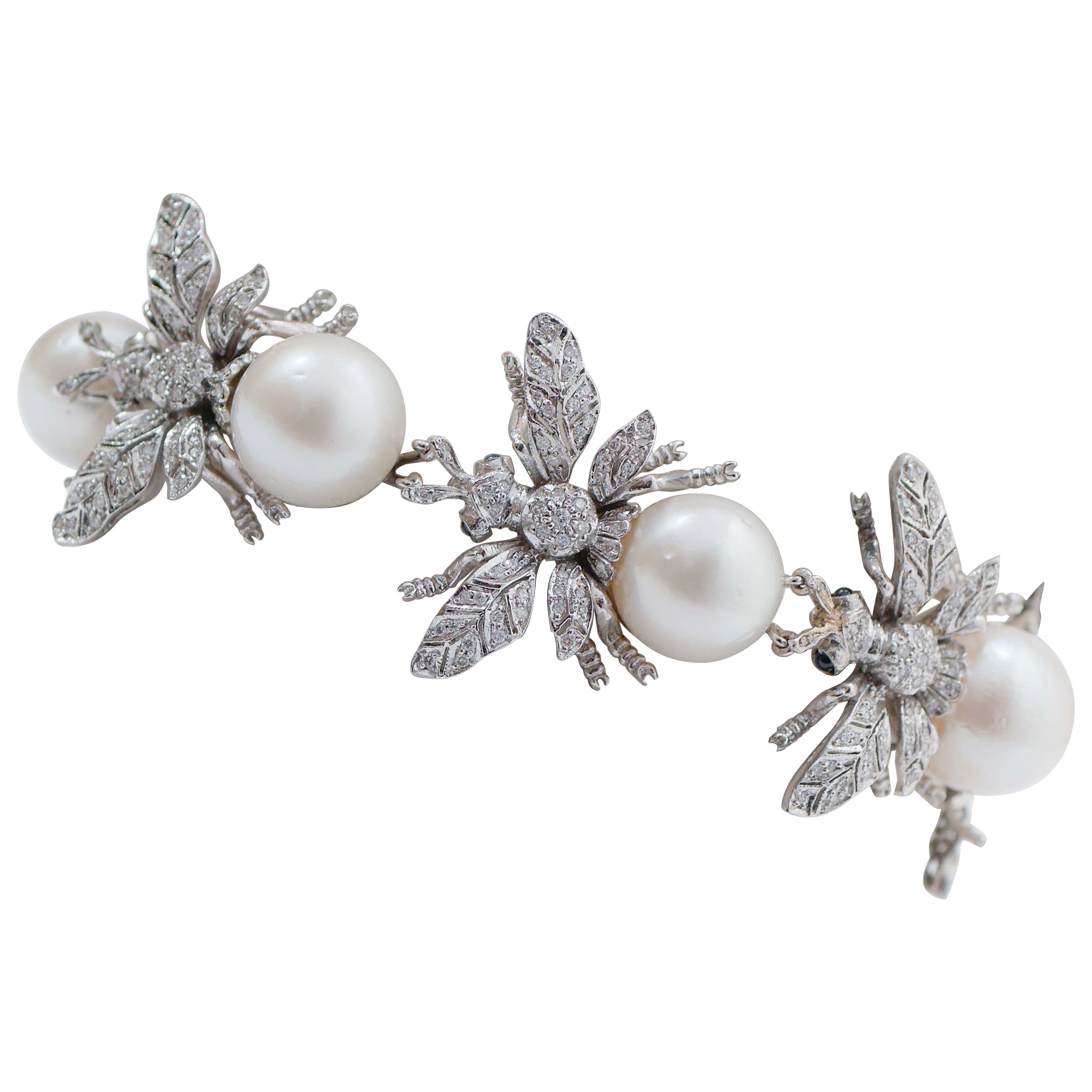 South-Sea Pearls, Sapphires, Diamonds, 14 Karat White Gold Fly Shape Bracelet. For Sale