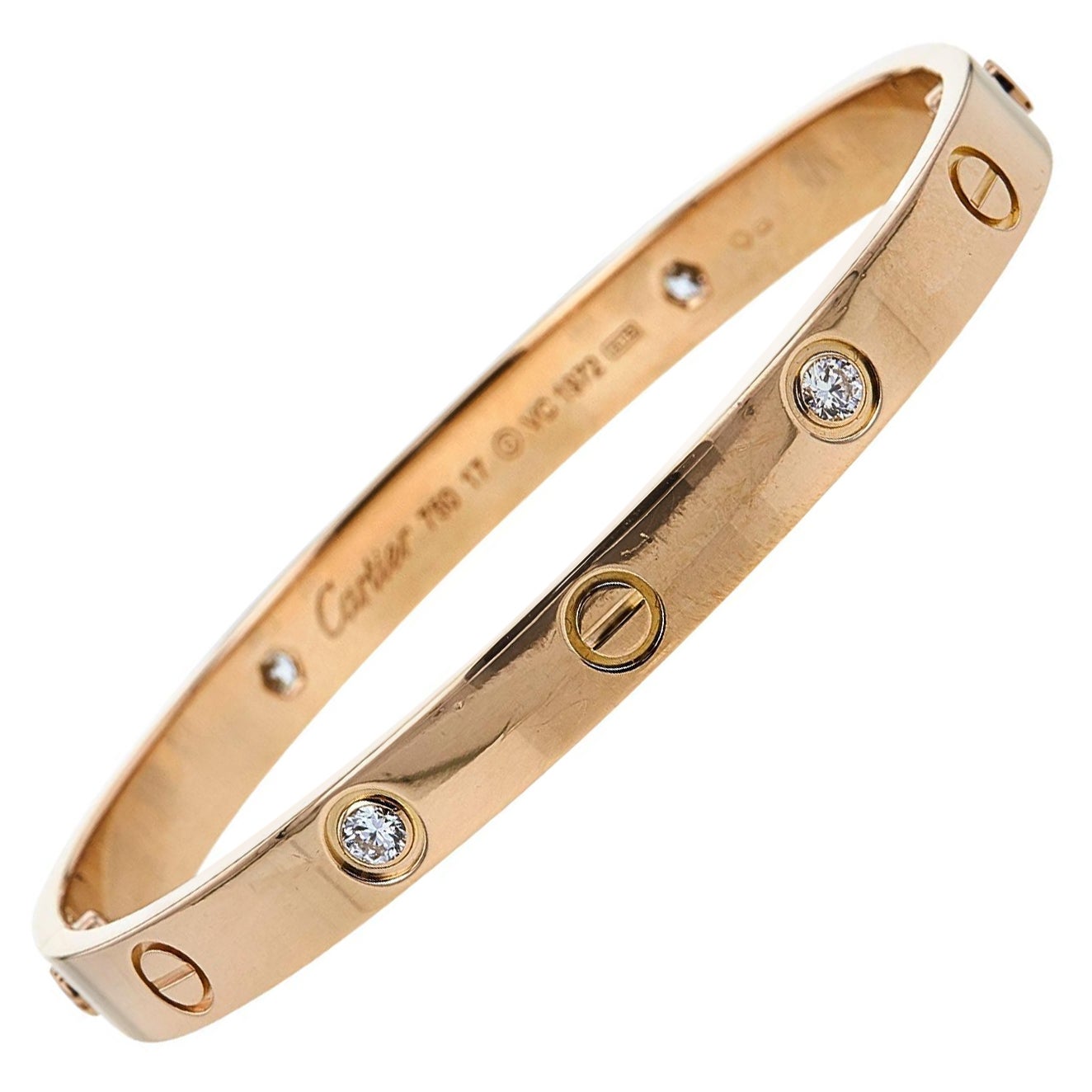 Bracelet Love de Cartier en or rose à 4 diamants. Taille 17