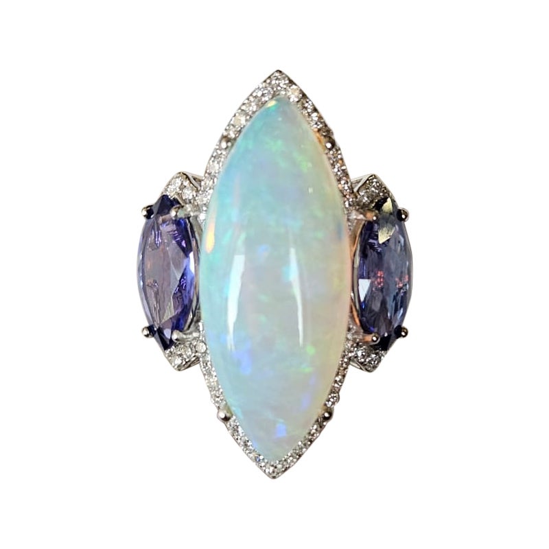 Set in 18K Gold, 10.07 carats Ethiopian Opal, Tanzanite & Diamonds Cocktail Ring For Sale