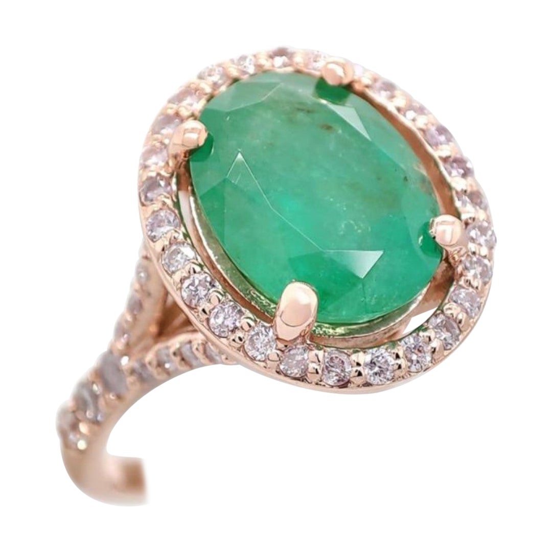 2.10ct Oval Emerald and Diamond Halo Ring For Sale