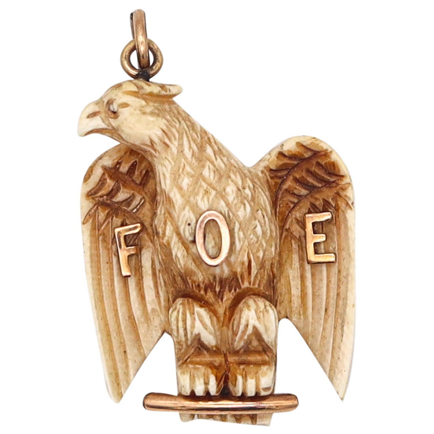 Fraternal Order Of Eagles 1900 Carved Eagle Pendant With 10Kt Yellow Gold Mount For Sale