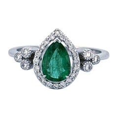 Captivating Emerald Elegance: 0.72 Carat Emerald and Diamond Ring