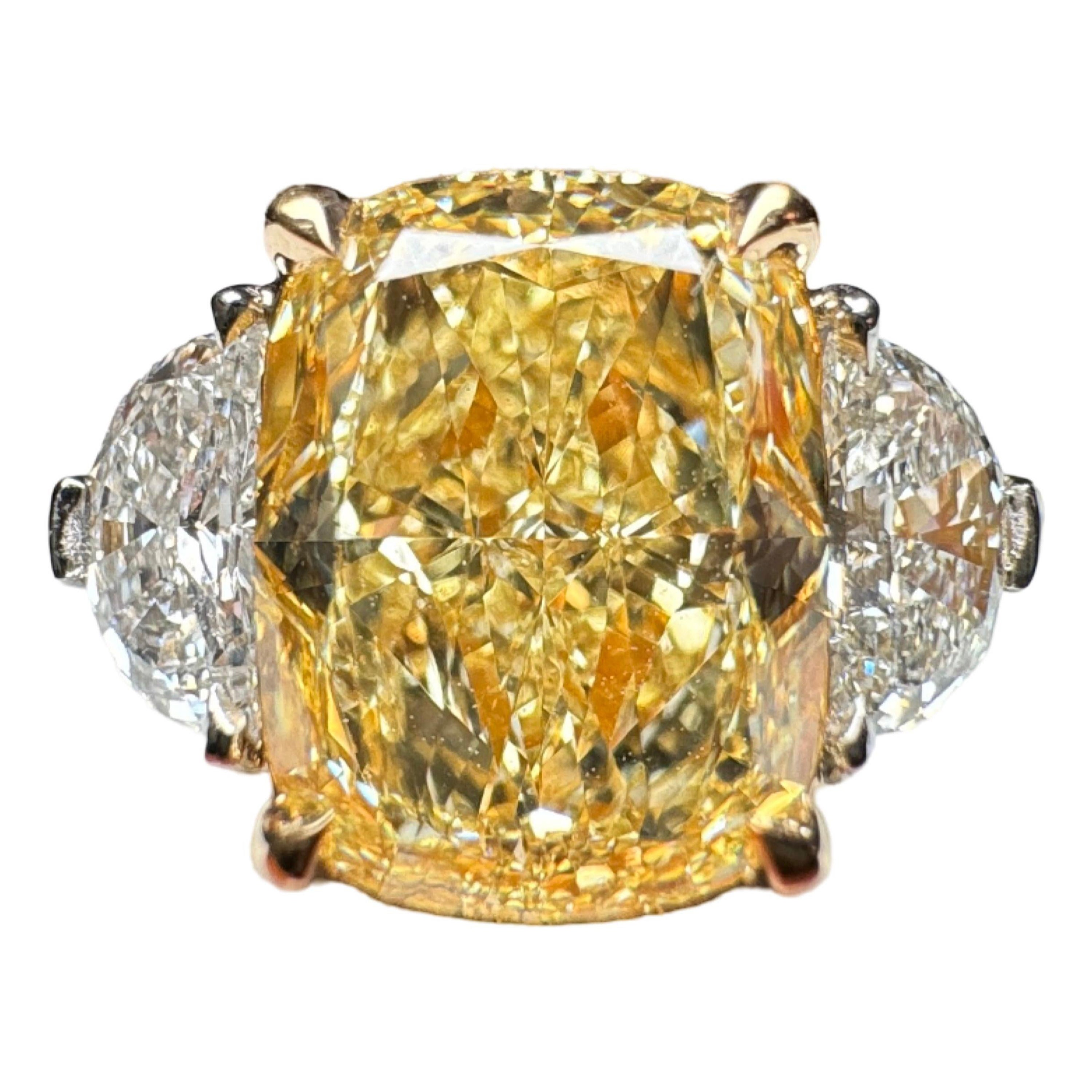 GIA Certified 2.47 Carat Cushion Cut Fancy Yellow Diamond Three Stone Ring For Sale