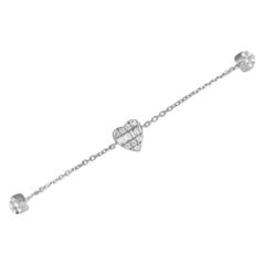 Bracelet cœur en or blanc 14 carats et diamants 0,25 carat