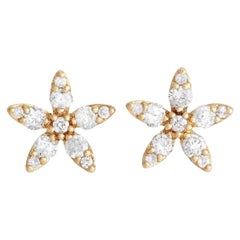 Boucles d'oreilles fleur en or jaune 14K avec 0,60ct de diamant