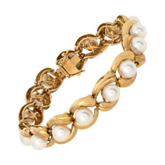 Silver and rose gold overtone Pearl 14k Yellow Gold Bracelet 