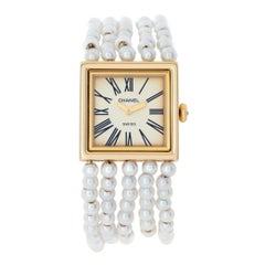 Chanel Mademoiselle Montre-bracelet à quartz en or jaune 18 carats Réf. h0007