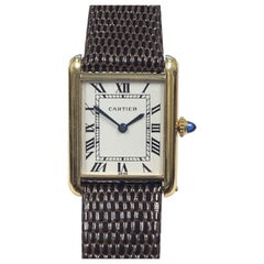 Cartier, montre-bracelet mécanique Tank emblématique vintage en or jaune