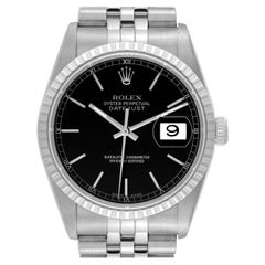 Rolex Datejust Stahl-Herrenuhr mit gedrechselter Lünette und schwarzem Zifferblatt 16220