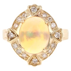 Bague en or jaune 14 carats avec opale de 2,92 carats et diamants