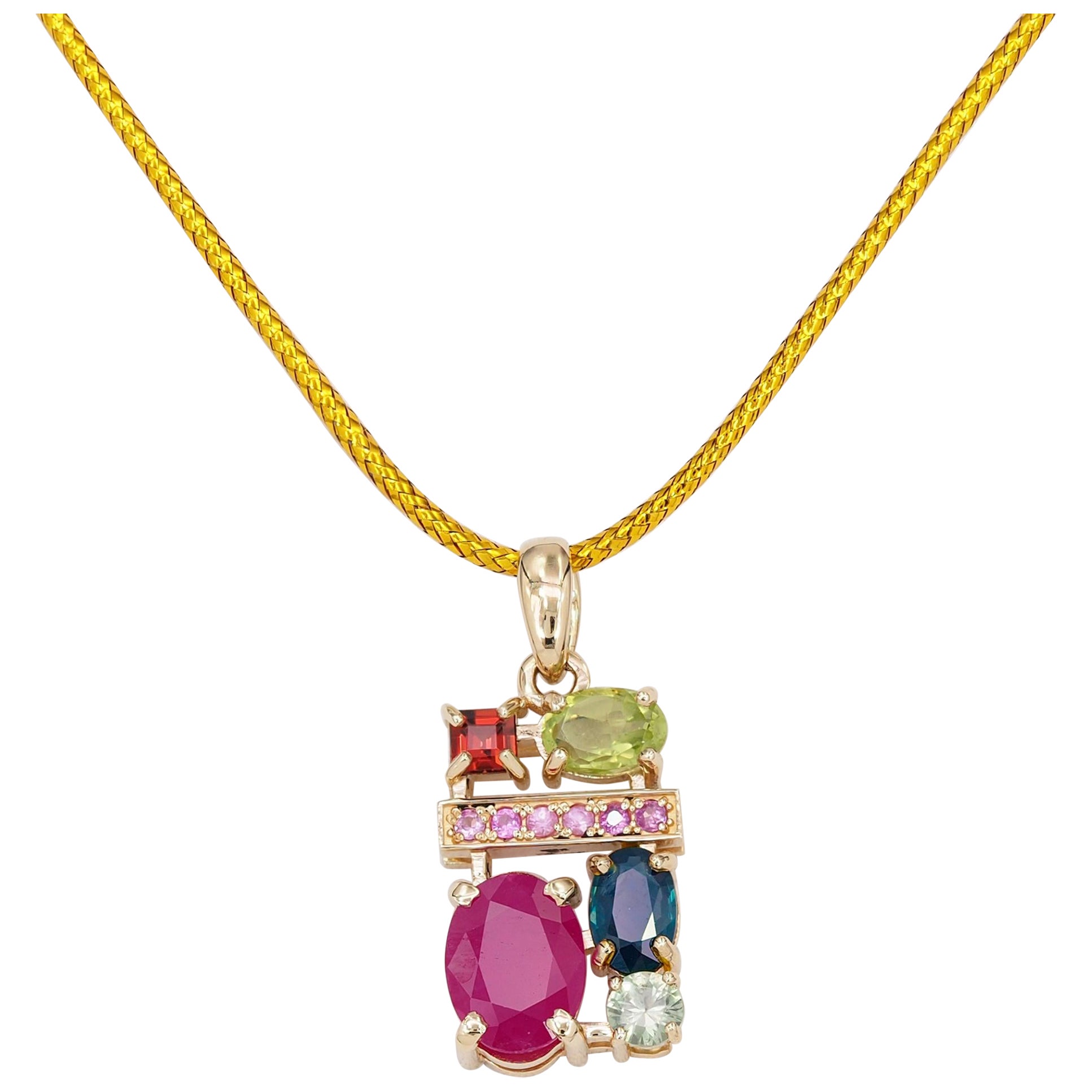 Ruby, sapphire, peridot, tourmaline, garnet and side pink sapphires pendant For Sale