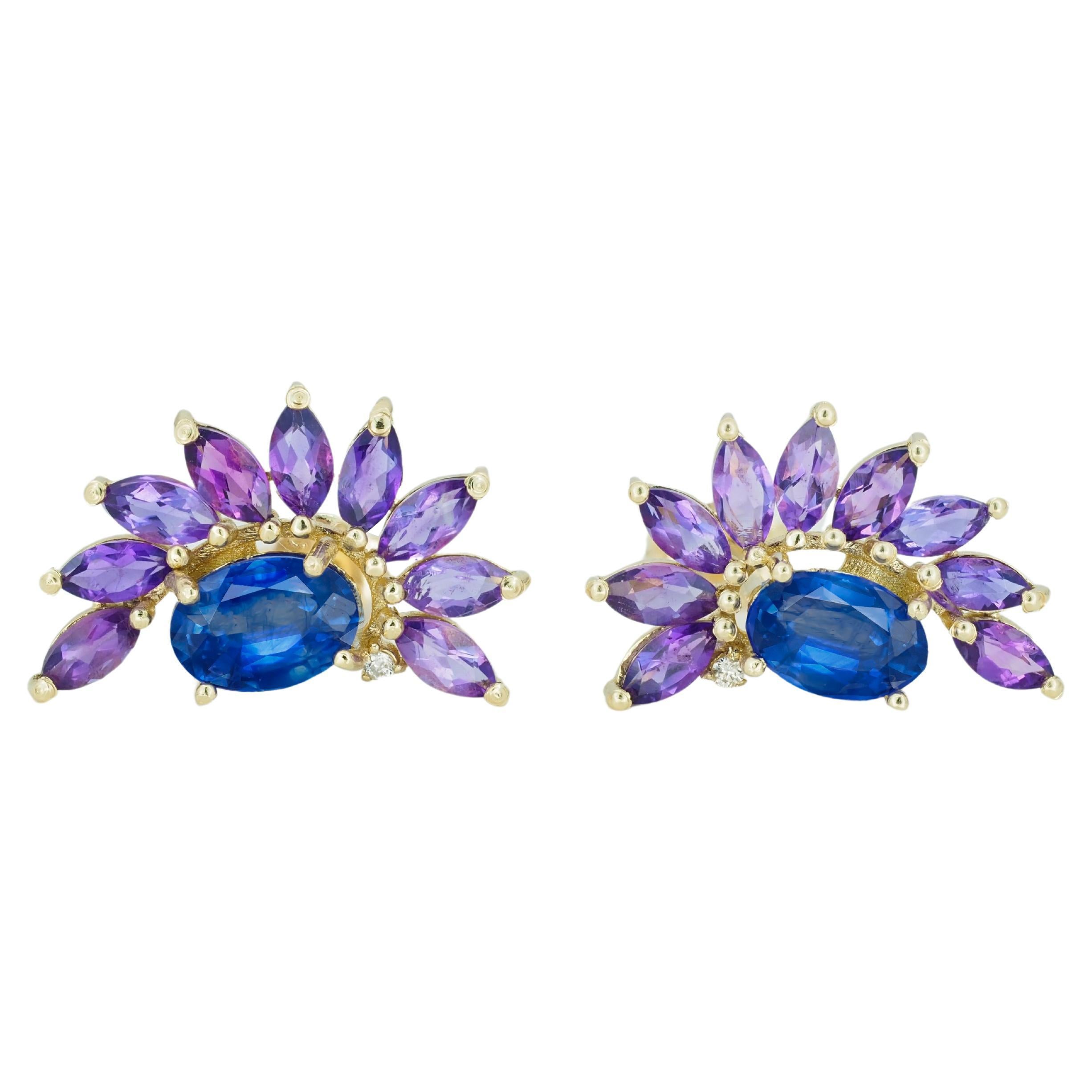 Sapphire 14k gold earrings studs.  For Sale
