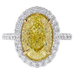 GIA Certified Natural Yellow Oval Diamond 5.78 Carat TW Gold Cocktail Ring