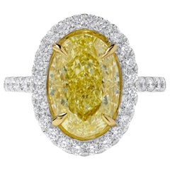 GIA Certified Natural Yellow Oval Diamond 5.78 Carat TW Gold Cocktail Ring