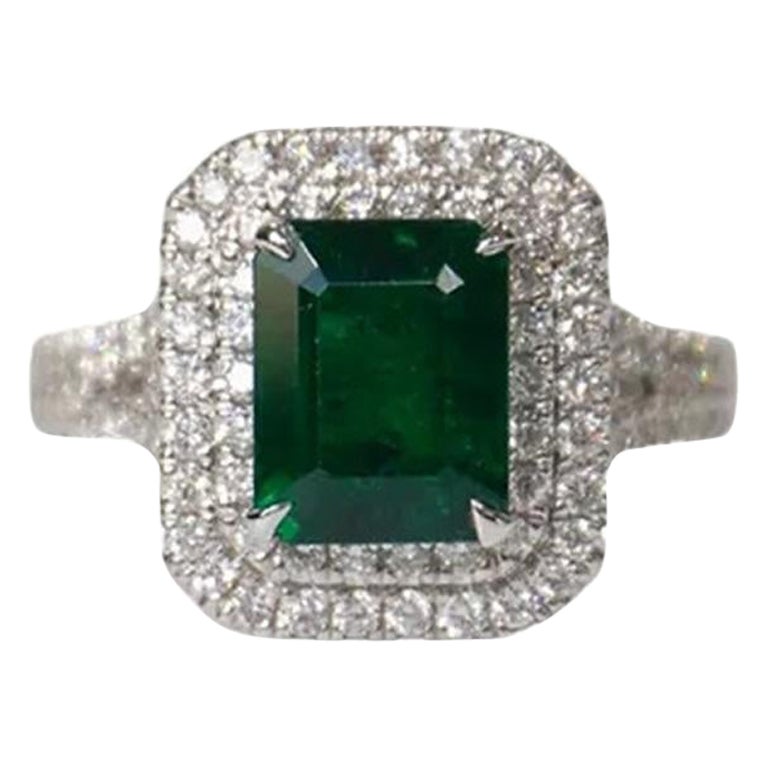 2.37 Carat Emerald Double Halo Ring For Sale