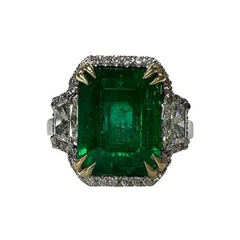5.30 Carat Emerald halo three stone ring For Sale