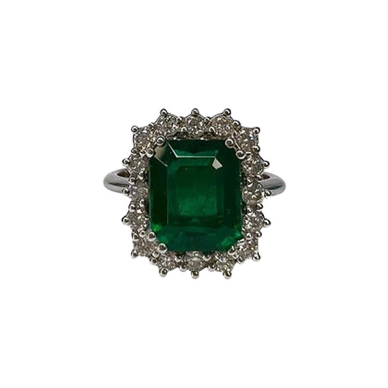 3.27 Carat Emerald Halo Ring For Sale