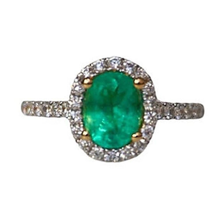 1.21 Carat Colombian Emerald Oval Ring For Sale