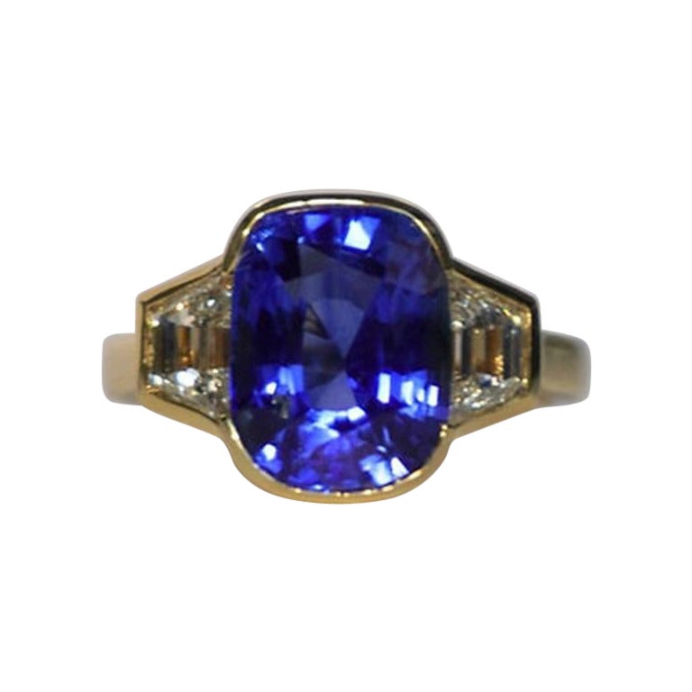 5.50 Carat Ceylon Sapphire Three-Stone Bezel Ring For Sale