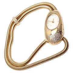 Van Cleef & Arpels Montre-bracelet Cadenas Serti à quartz en or jaune et diamants, pour femmes