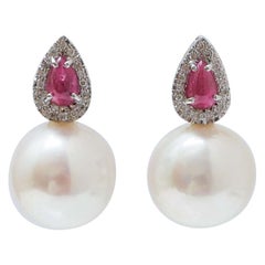 White Pearls, Diamonds, Rubies, Platinum Earrings.