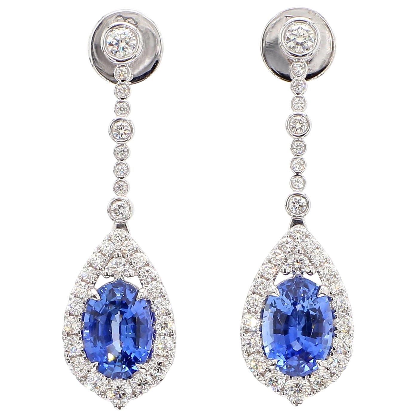 Natural Blue Oval Sapphire and White Diamond 5.20 Carat TW Gold Drop Earrings For Sale